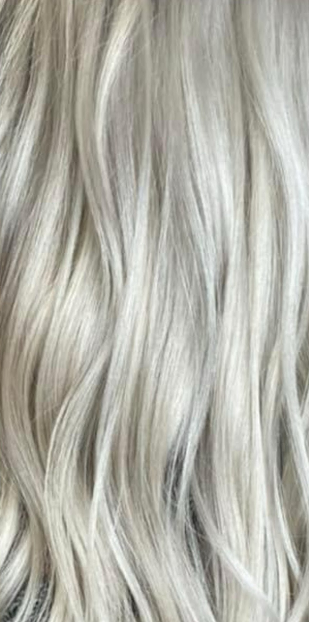 Close-up van zilverblonde haartextuur
